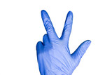 hand gesture three  in blue medical glove isolated, close up, selective focus, white background