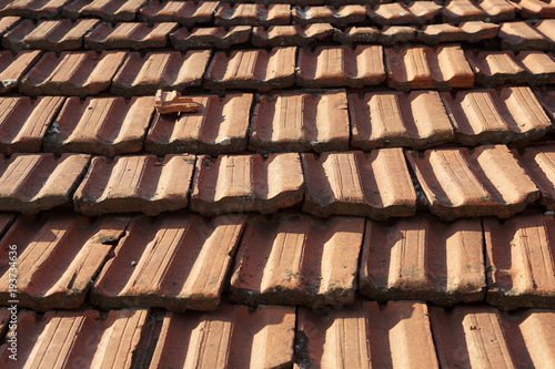 Cracked clay roof tiles