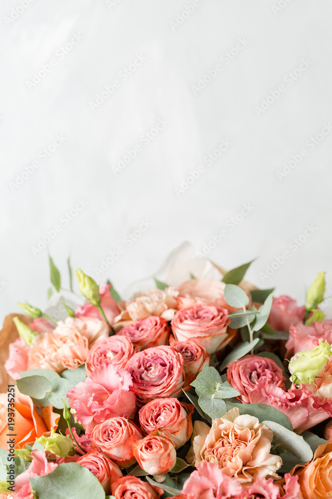 Flower composition on a gray background. Wedding and Festive decor. Powdery pink color. copy space. closeup
