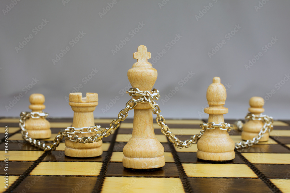 Chess Board with King, Queen and Rook in Checkmate Stock Photo - Alamy