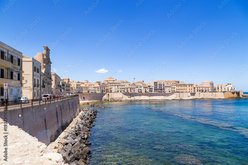 Fototapeta premium Syracuse, Italy. Picturesque old quay on the island of Ortygia