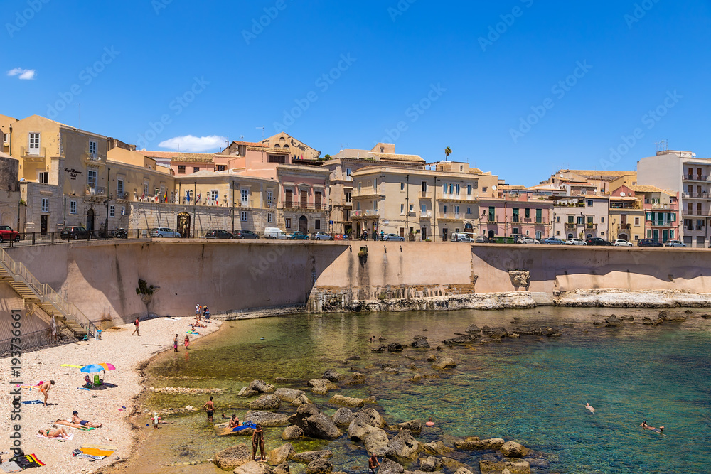 Syracuse, Italy. Beautiful old quay on the island of Ortygia, a small beach