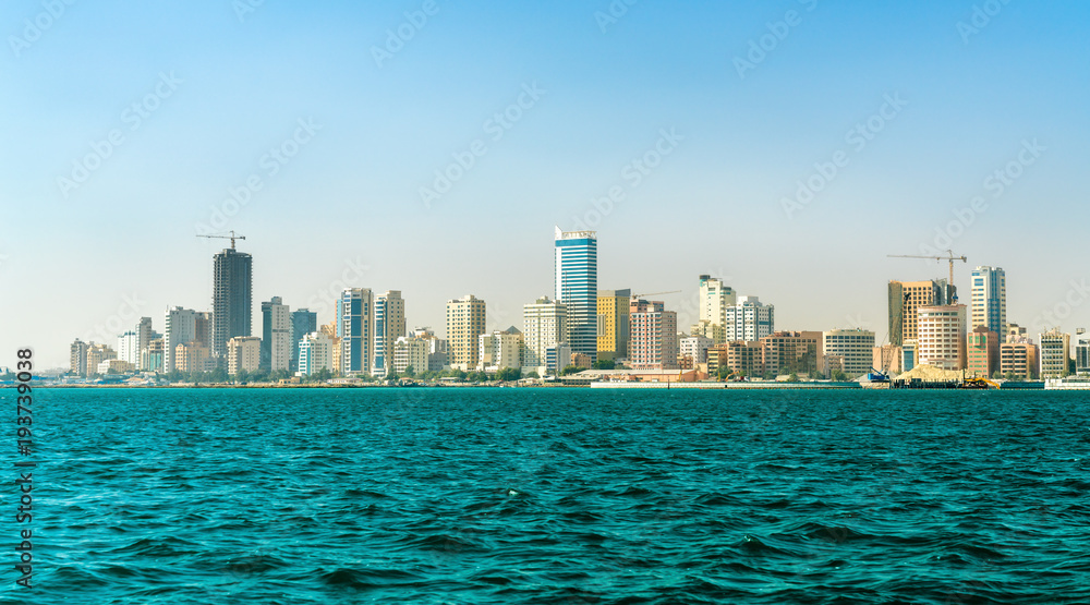 Fototapeta premium Skyline of Manama from the Persian Gulf. The Kingdom of Bahrain