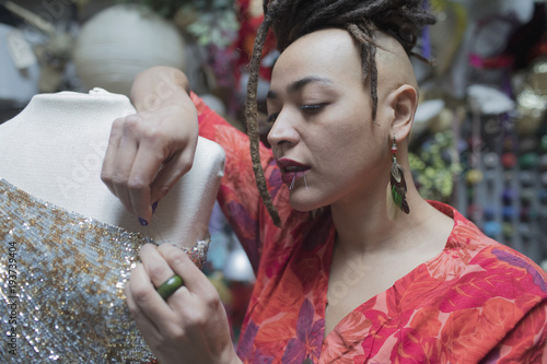 Young female designer working at studio