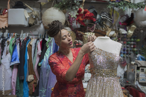 Young female designer working at studio