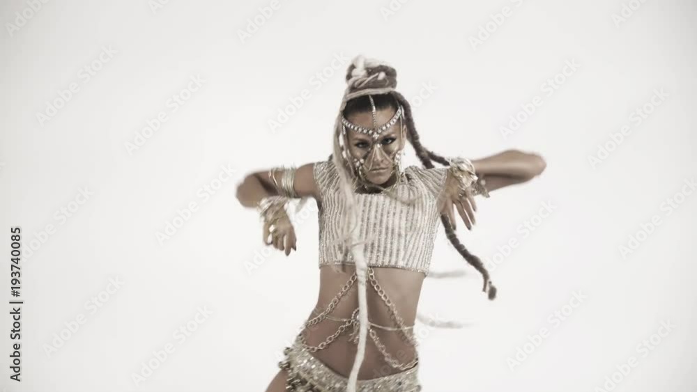 Oriental beautiful girl dancing on a white background Oriental beautiful girl dancing on a white background