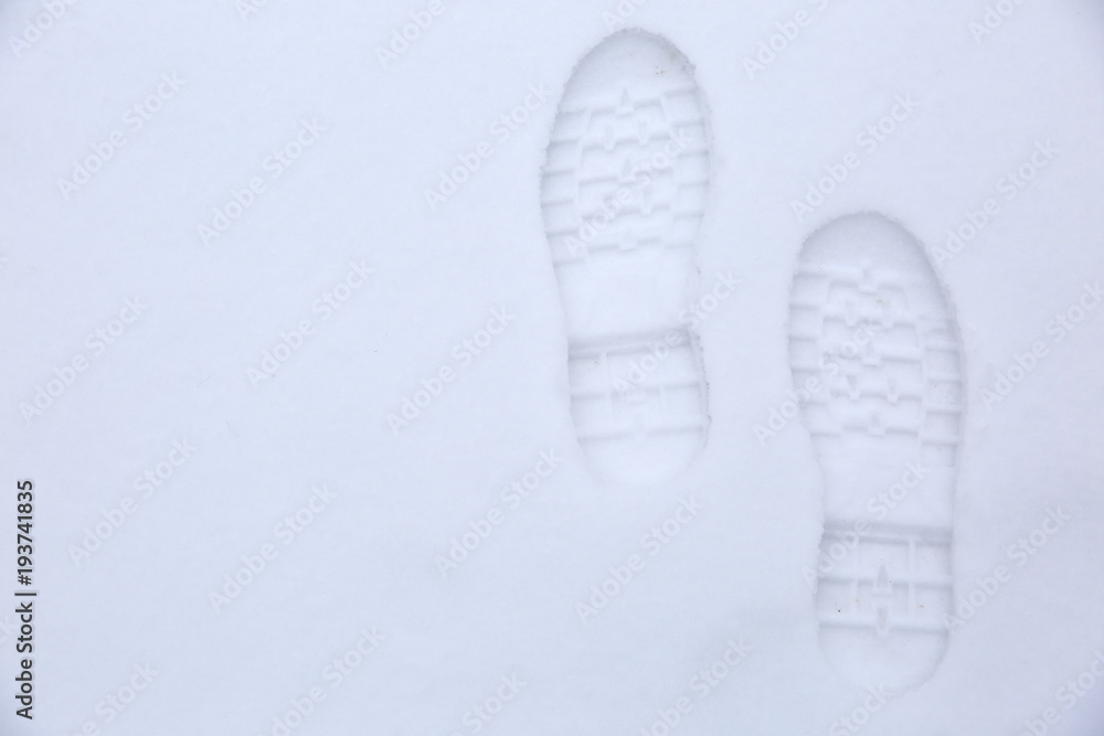 Footprints of shoes on fresh snow. Footprints of shoes on fresh snow.