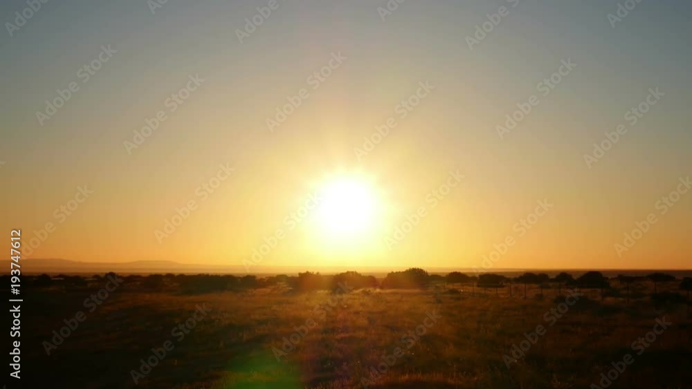 Bright Sun over Field Time Lapse