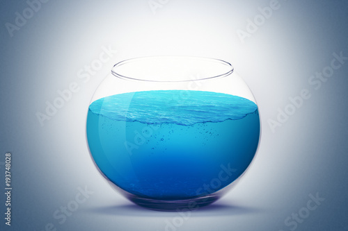 Foto Isolated fishbowl aquarium with sea water on light background.