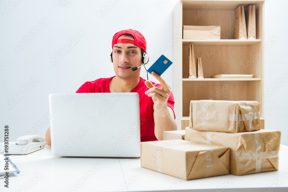 Call center worker at parcel distribution center in post office Call center worker at parcel distribution center in post office