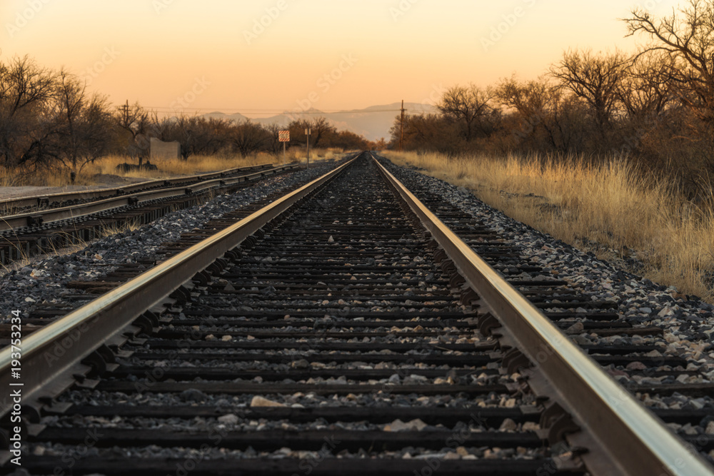 Train tracks sunset converging lines Train tracks sunset converging lines