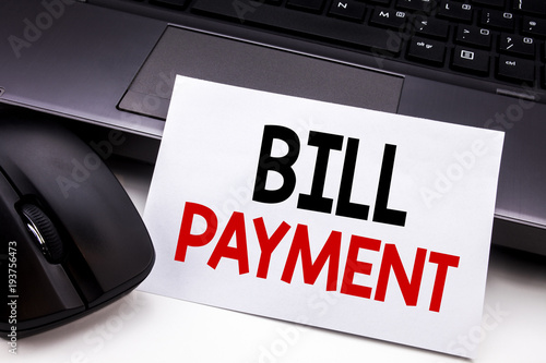 Conceptual hand writing text caption inspiration showing Bill Payment. Business concept for Billing Pay Costs written on sticky note paper on the black keyboard background. photo