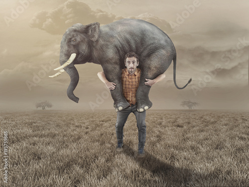 Man takes an elephant back