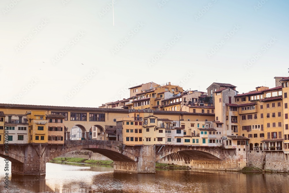 Sunny day in Florence, river Arno, The views of Ponte Vecchio and the Uffizi gallery, The historic centre of Florence