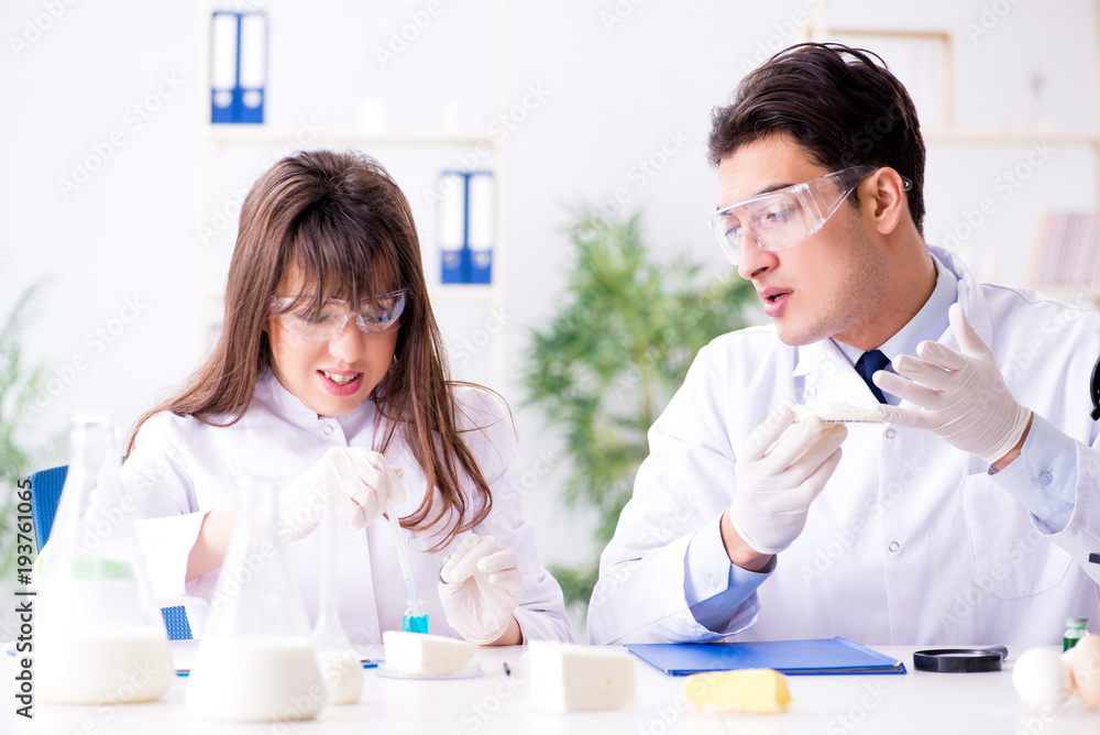 Two lab doctor testing food products Two lab doctor testing food products