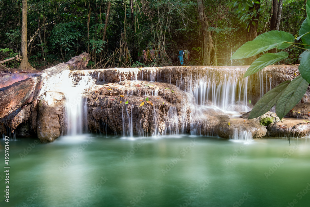 Obraz premium Erawan waterfall in tropical rainforest
