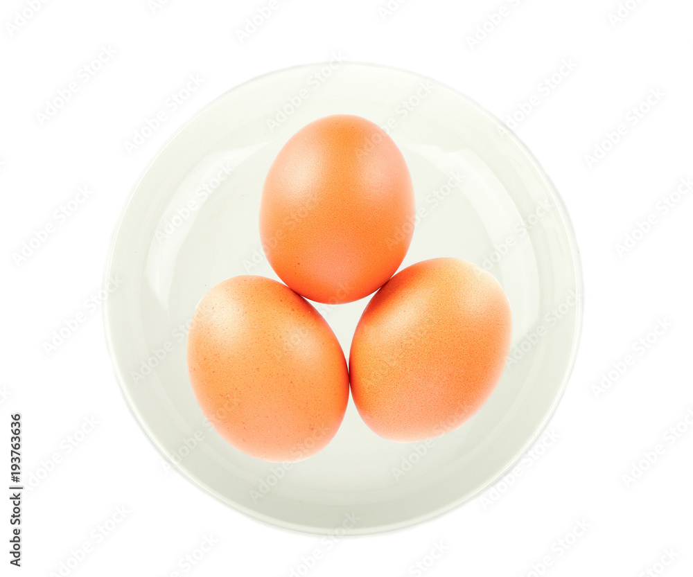 Eggs in white plate on white background Eggs in white plate on white background