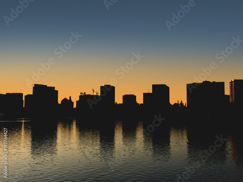 Oakland City Skyline Silhouette Cityscape Above Lake Merritt Bay Area