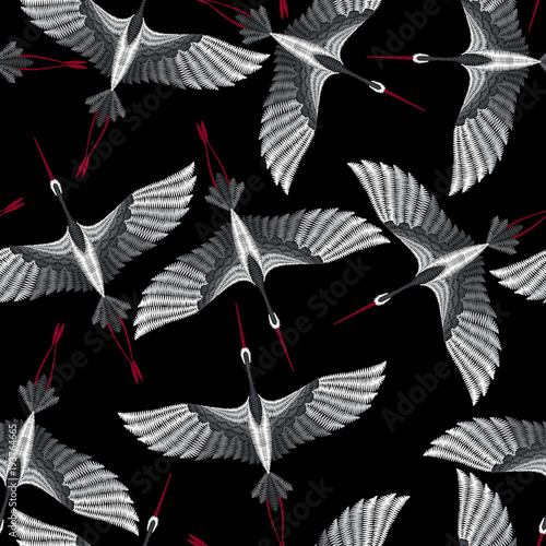 Embroidery seamless pattern with beautiful asian crane. Vector embroidery for fashion textile and fabric.