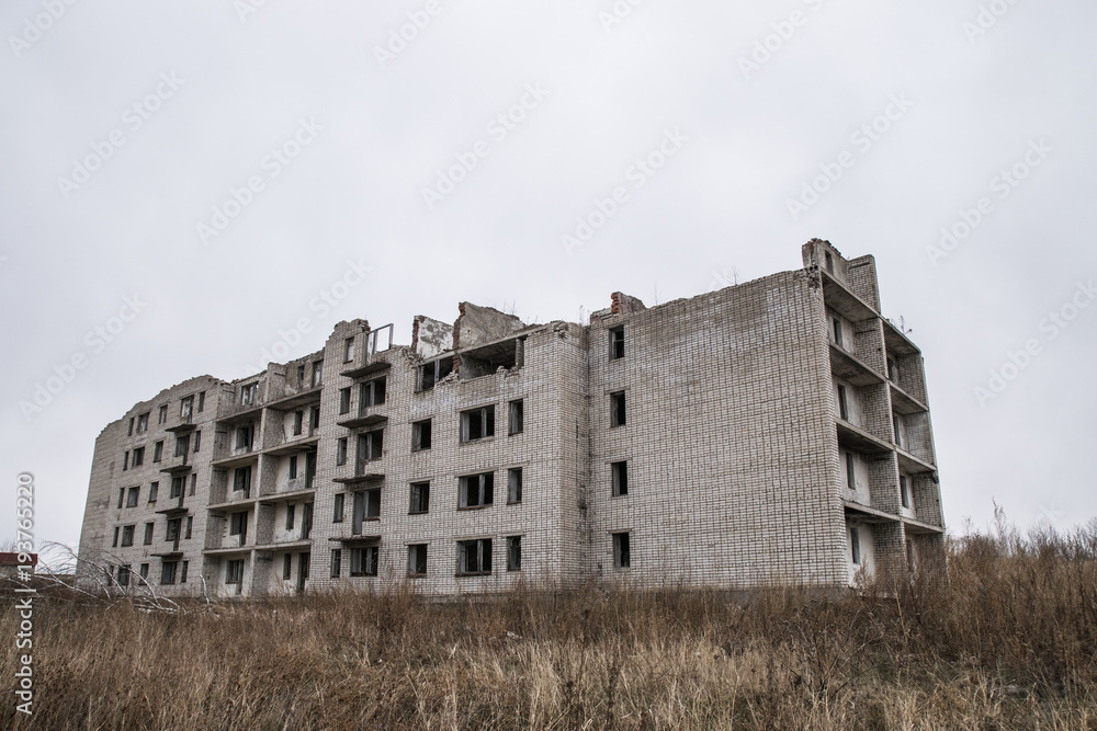 Old destroyed an abandoned multi-storey building in a military town Old destroyed an abandoned multi-storey building in a military town