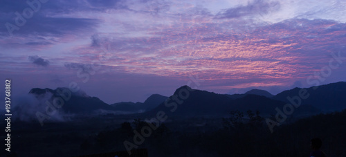 Mountain with fog and twilight morning