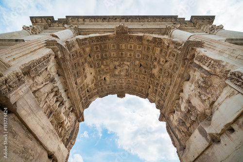 Fotografija Under the Arch of Titus at The Roman Forum in Rome, Italy