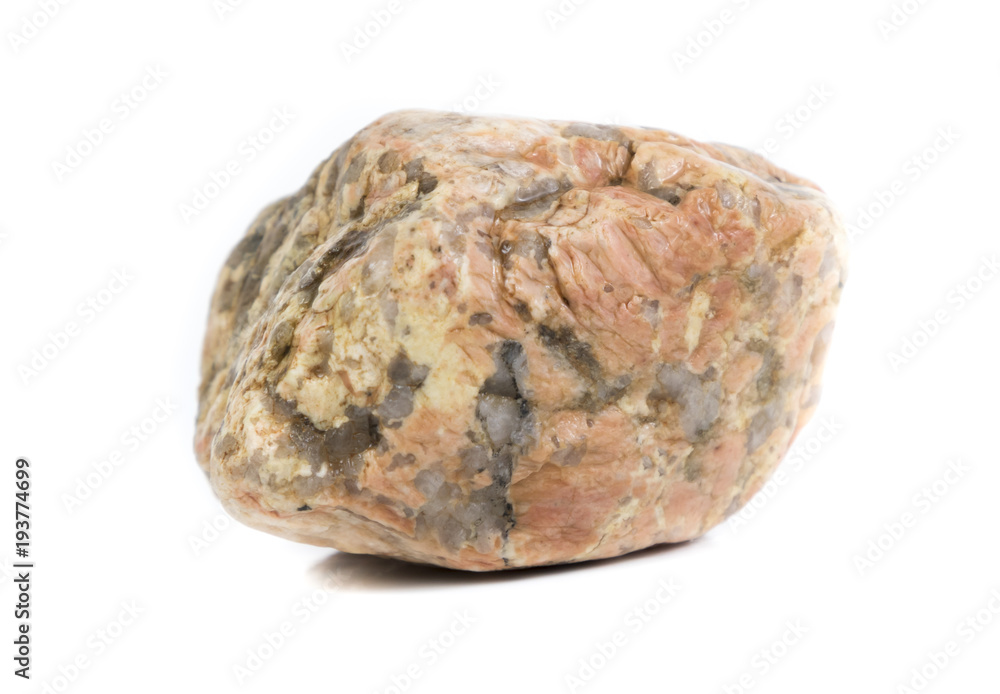 Single natural stone on white background, close-up Single natural stone on white background, close-up