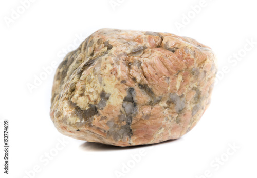 Single natural stone on white background, close-up