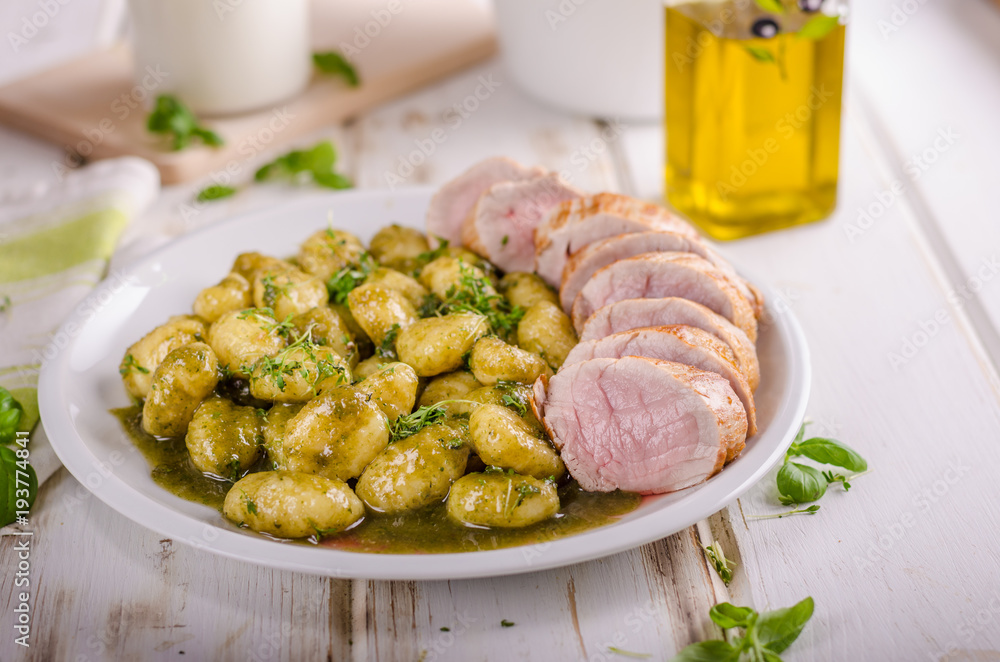 Pork tenderloin with herbs and spices, pesto gnocchi Pork tenderloin with herbs and spices, pesto gnocchi