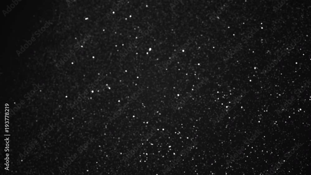 dust particles, abstract floating particles on black background, glittering particles with bokeh, 4K slow motion animation dust particles, abstract floating particles on black background, glittering particles with bokeh, 4K slow motion animation