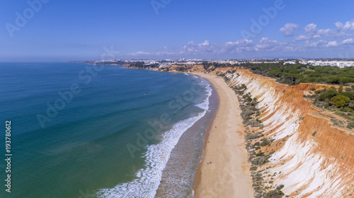 Aerial rocks and cliffs seascape shore view of famous Falesia beach, Algarve. photo