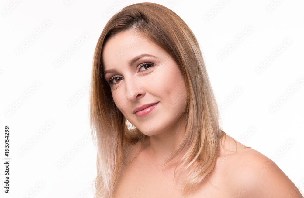 Beautiful female with cared skin. Posing on camera. Beautiful female with cared skin. Posing on camera.