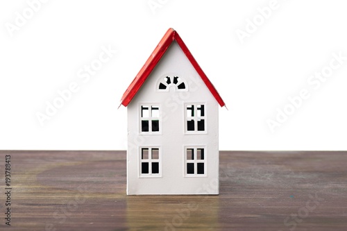 House over isolated white background on table