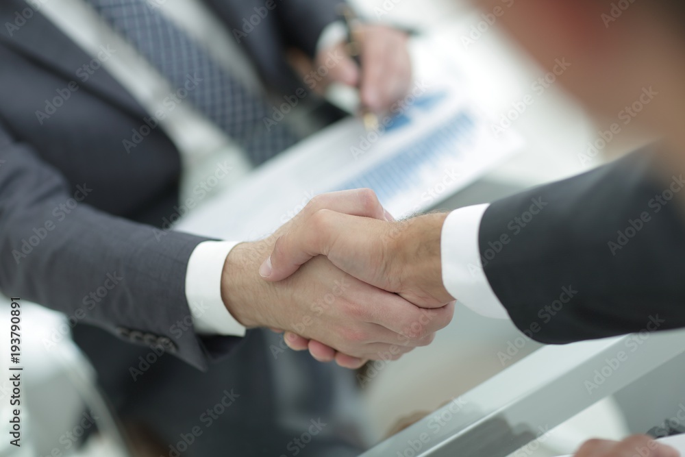 closeup.handshake of two businessmen