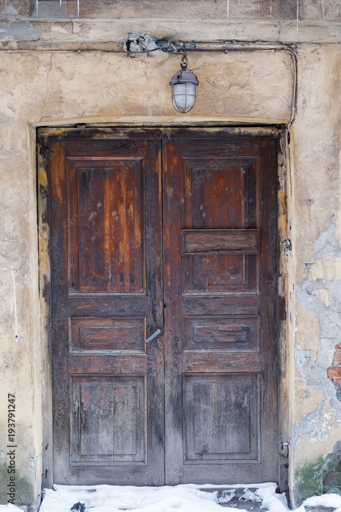 beautiful old wooden door with a visor beautiful old wooden door with a visor