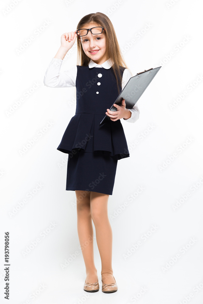 Little girl with clipboard in her hands dressed as a businesswoman Little girl with clipboard in her hands dressed as a businesswoman