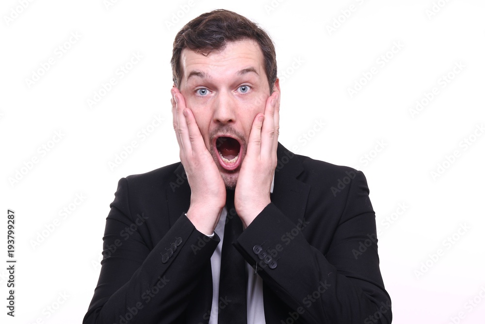 Young businessman with facial expressions Young businessman with facial expressions