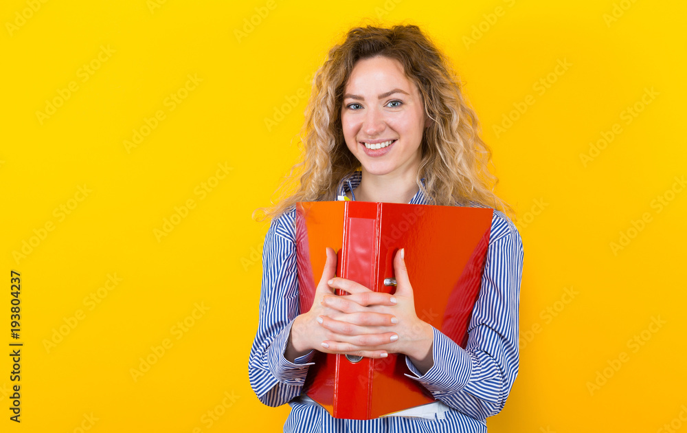 Woman in shirt with big folder