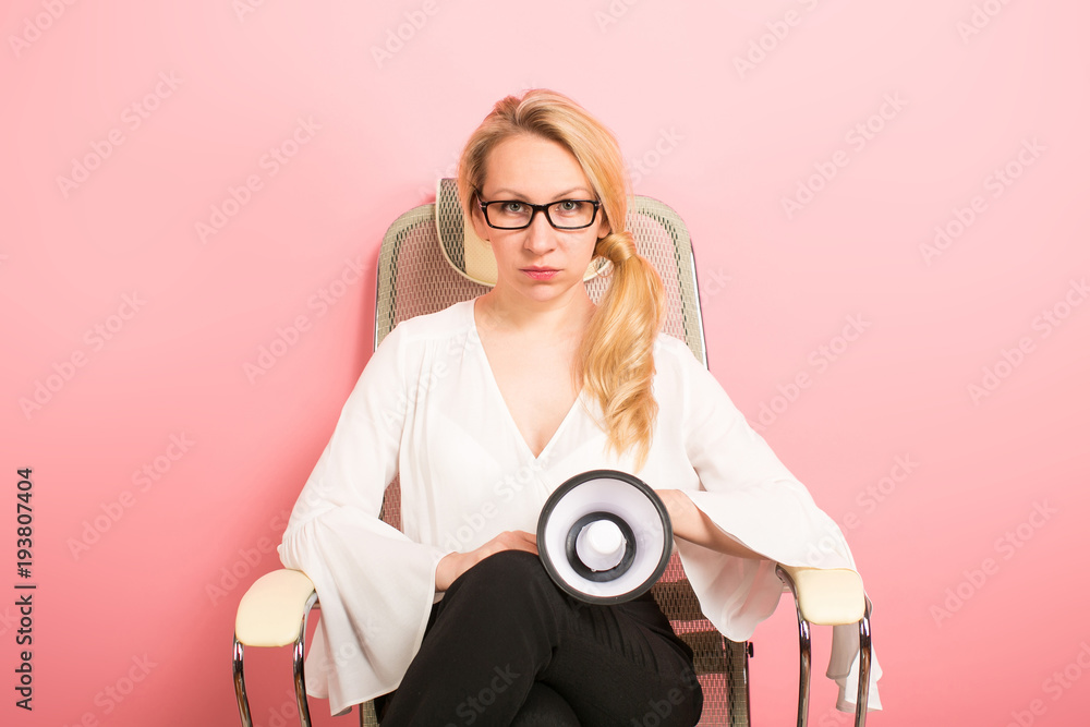 Fototapeta premium Angry businesswoman with loudspeaker