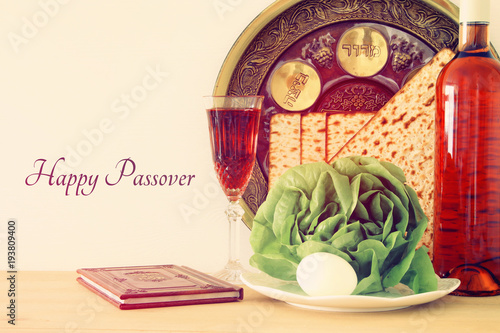 Pesah celebration concept  jewish Passover holiday . Traditional book with text in hebrew  Passover Haggadah  Passover Tale .