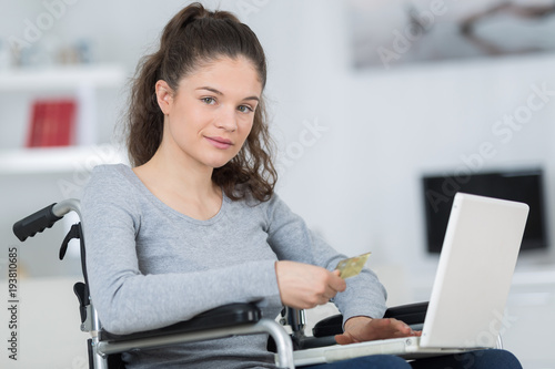 Photography woman on wheelchair with laptop