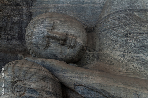 Reclining Buddha statue at Gal Vihara rock temple in the ancient city Polonnaruwa, Sri Lanka