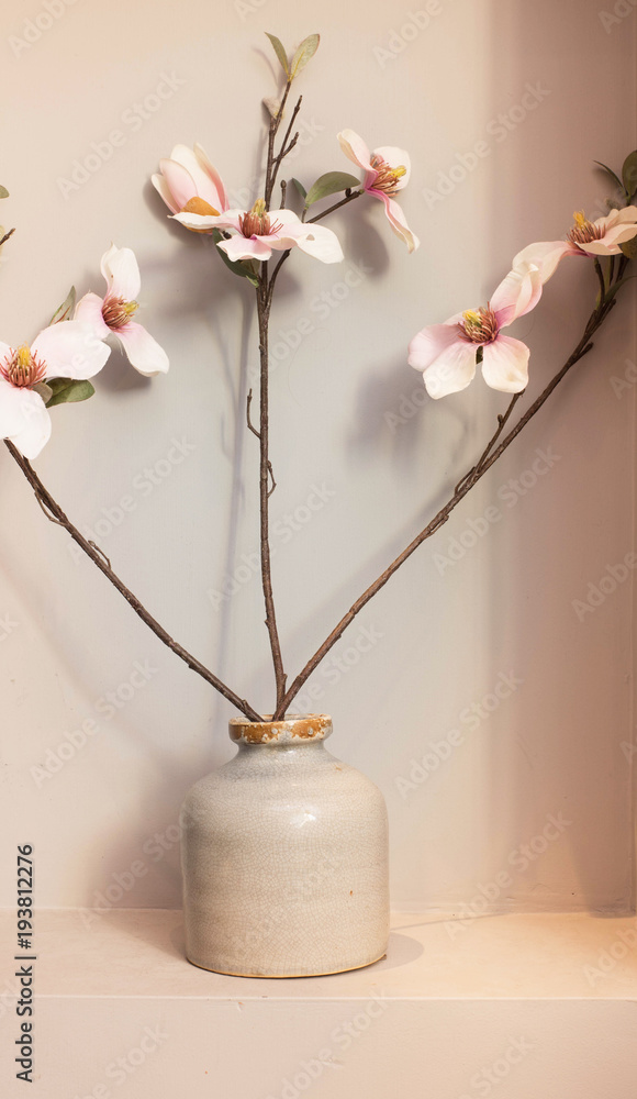 Orchid flowers in ceramic vase Orchid flowers in ceramic vase