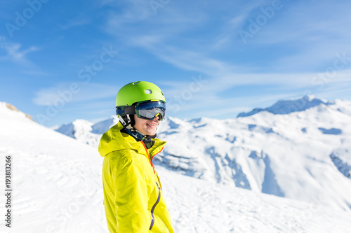 Photo of sports man wearing helmet on snowy slope © nuclear_lily
