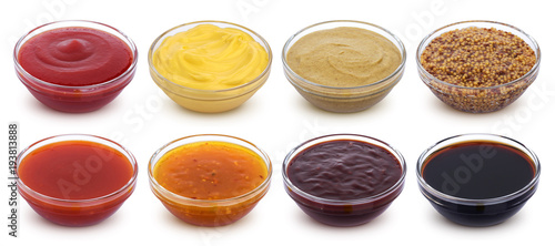 Different sauces isolated on white background