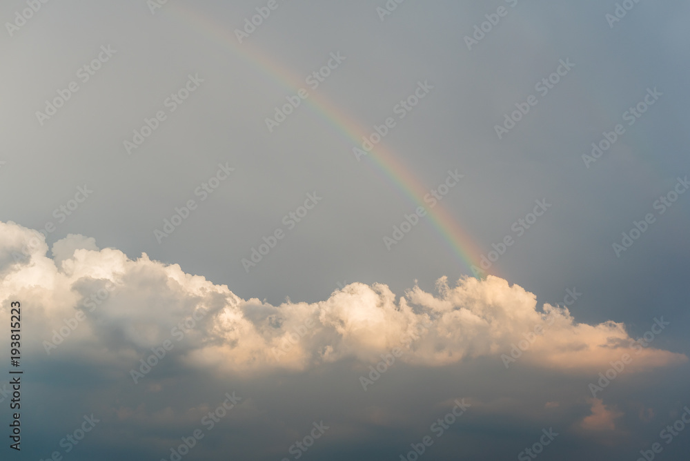 Rainbow in a dark cloudy sky, China Rainbow in a dark cloudy sky, China