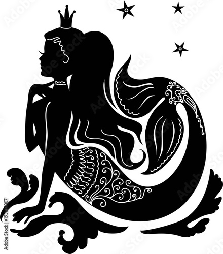 Silhouette mermaid sitting on the stone