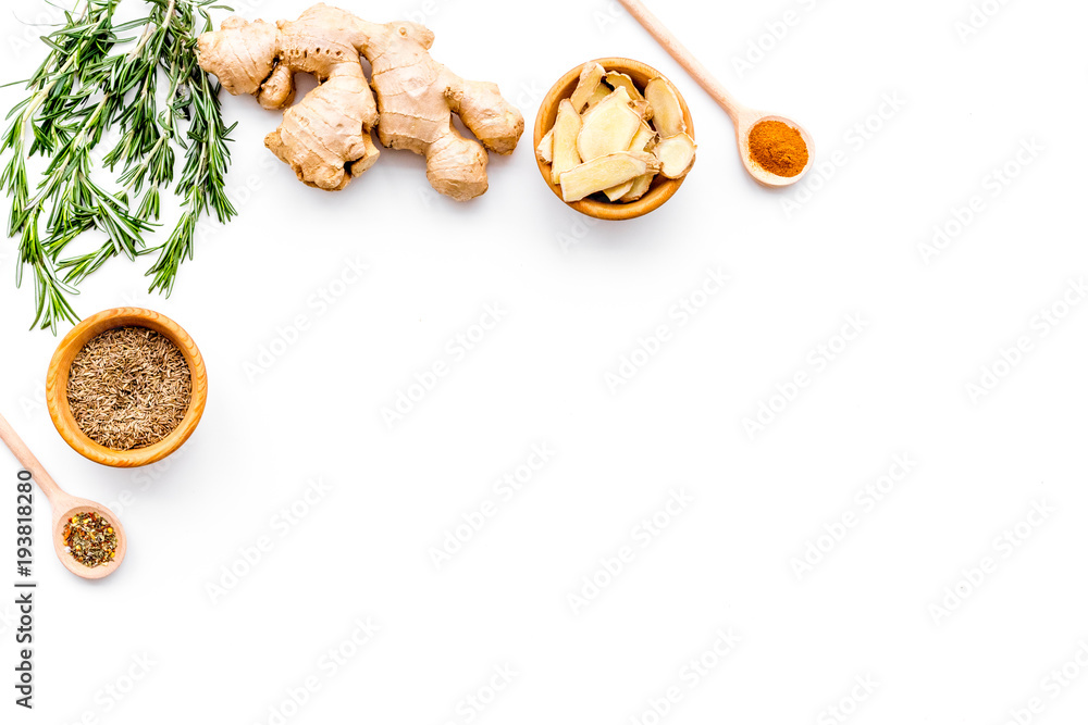 Dry spices near ginger and rosemary on white background top view copy space Dry spices near ginger and rosemary on white background top view copy space