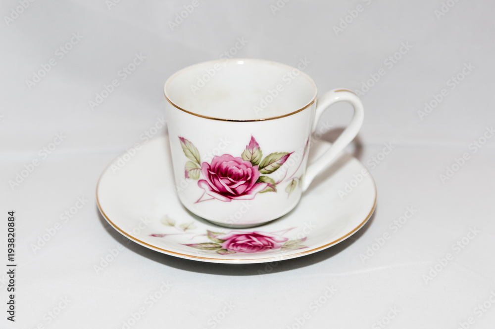 Fototapeta premium Elegant vintage cup with saucer for coffee or tea 