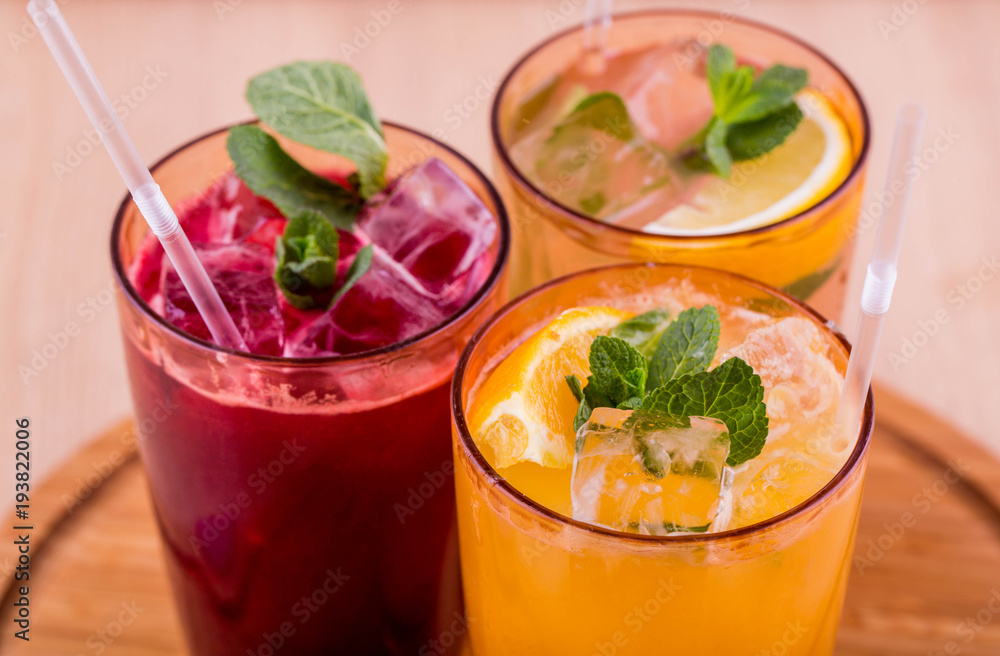Lemonades from natural berries and fruit with mint and ice Lemonades from natural berries and fruit with mint and ice